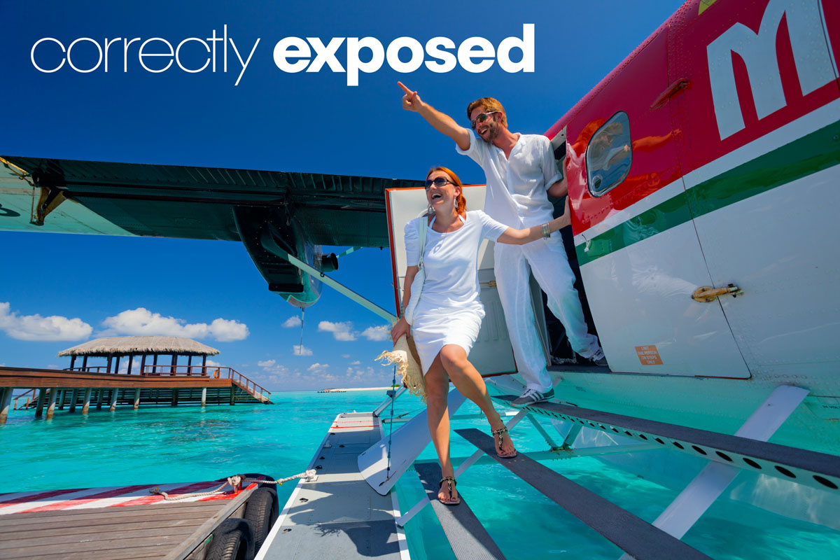 correctly exposed image of couple exiting seaplane on Maldives